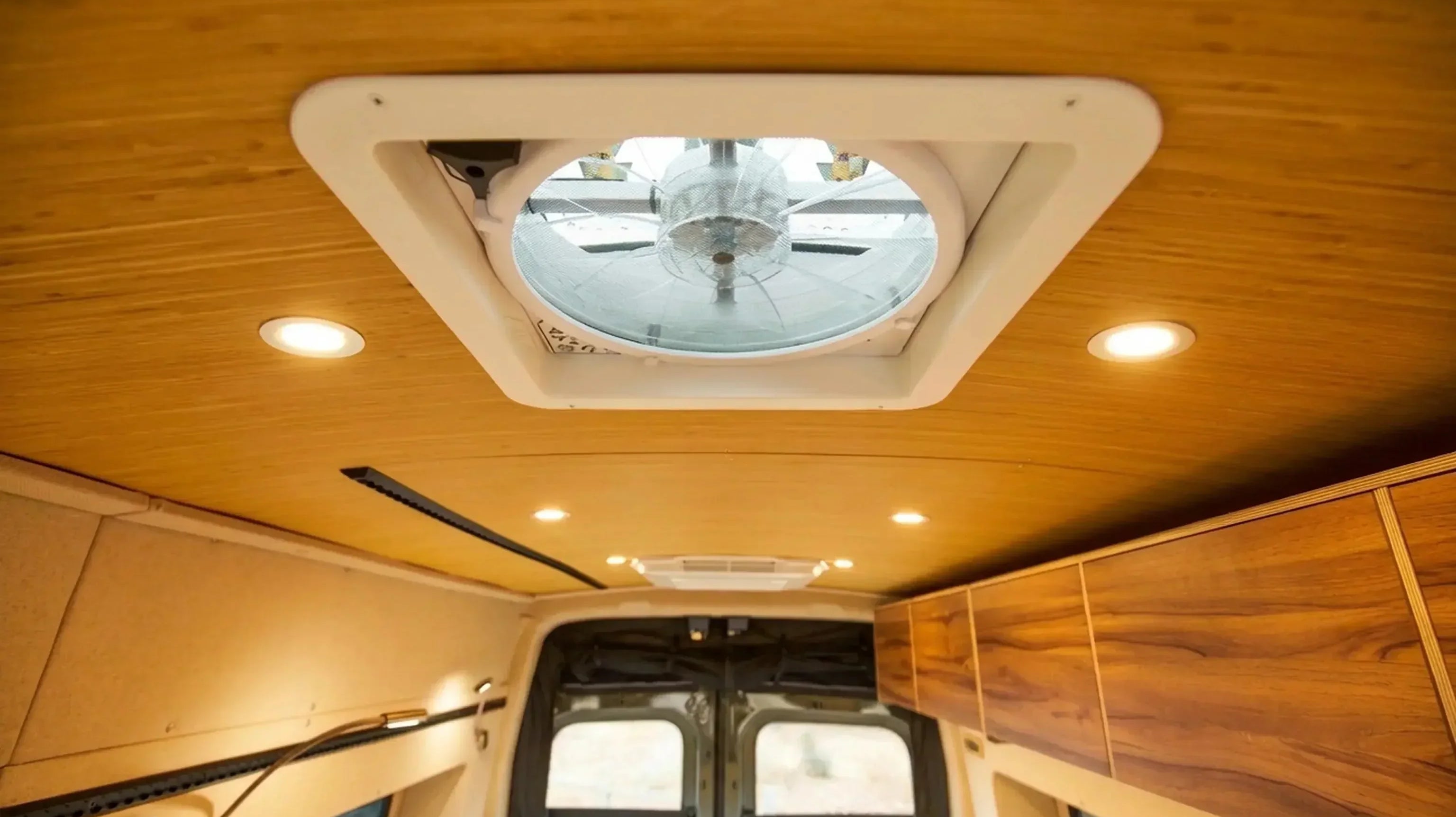 camper ceiling fan - Ceiling ventilation fan installed inside camper van roof
