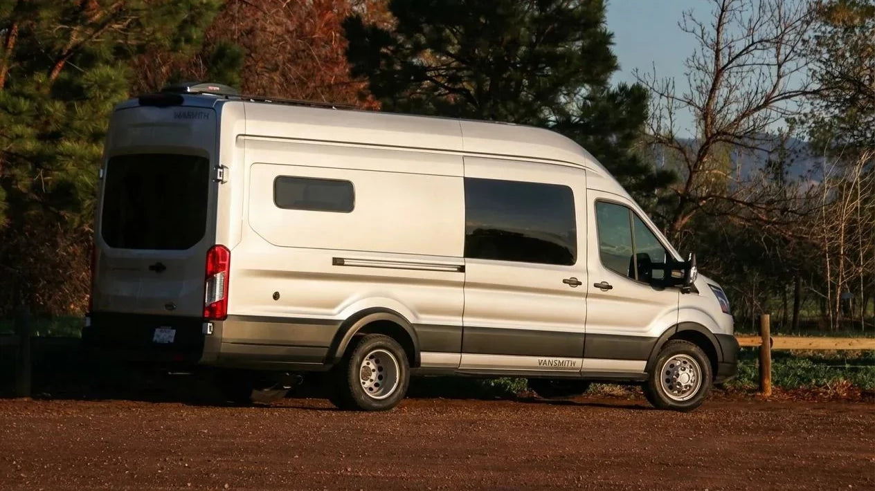 camper van financing rates - The exterior features a prominently positioned Ford Transit van with a sleek sil