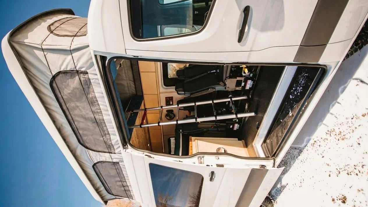 camper van mistakes - The most prominent feature in this photo is the rear cargo area of the camper va