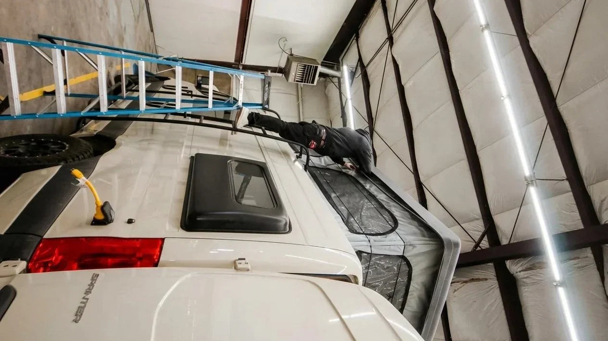 campervan roof extension - The most prominent feature in this photo is the pop-top roof section of the camp