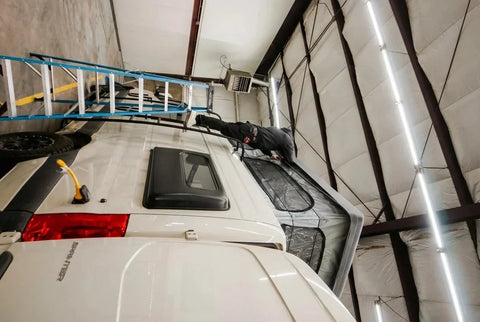 campervan roof extension - The most prominent feature in this photo is the pop-top roof section of the camp
