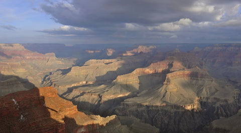 sunset spot - Grand Canyon seen from Hopi Point at sunset, with storm light over the rim