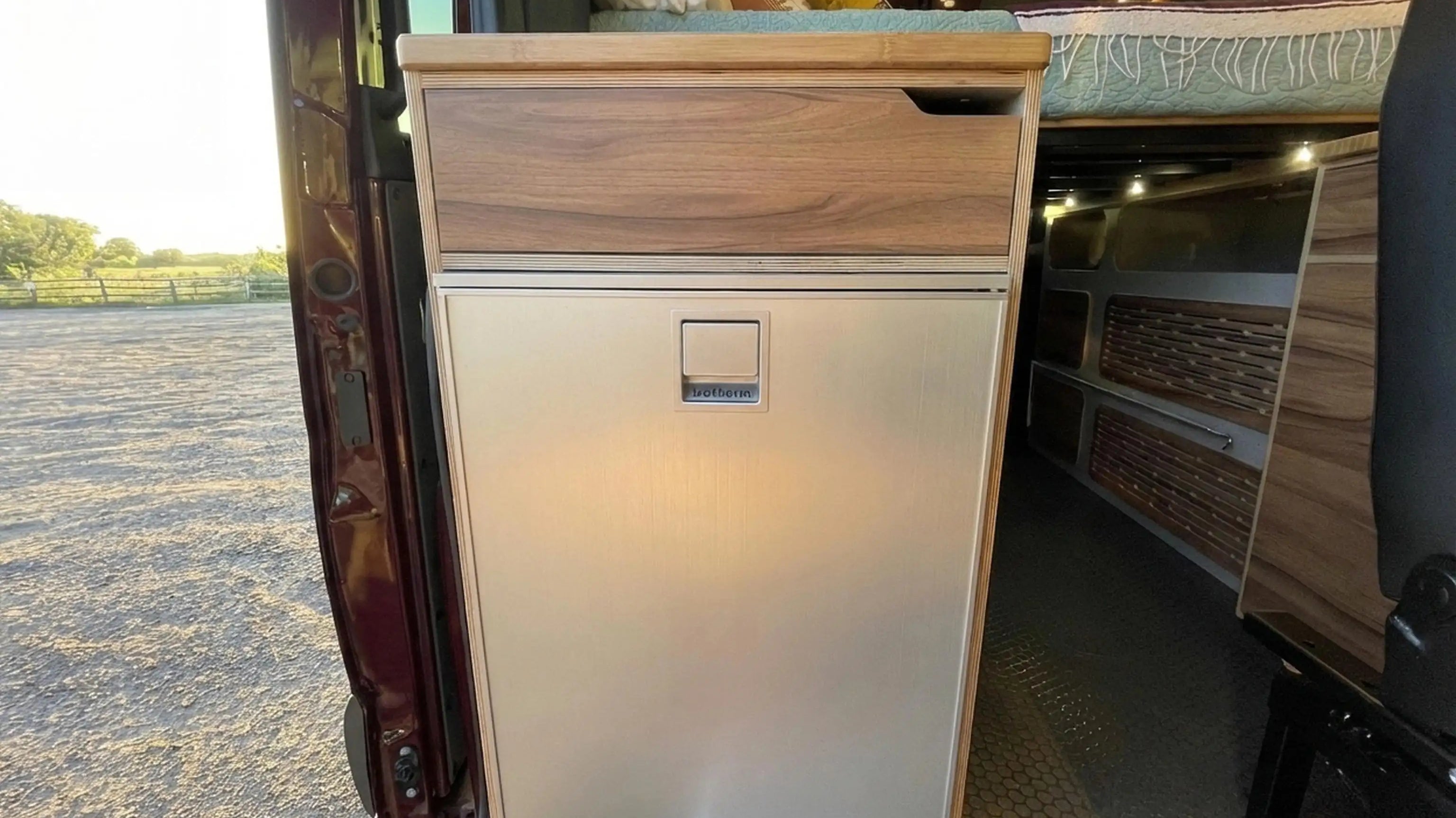 rv dealers in florida - Compact camper van refrigerator installed near sliding door