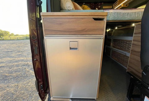 rv dealers in florida - Compact camper van refrigerator installed near sliding door