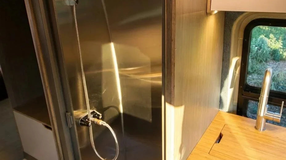 sprinter van with bathroom - The most prominent feature of this camper van is the compact shower enclosure, w
