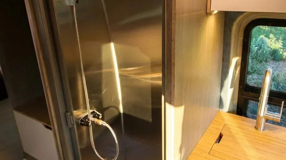 sprinter van with bathroom - The most prominent feature of this camper van is the compact shower enclosure, w