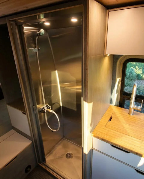 sprinter van with bathroom - The most prominent feature of this camper van is the compact shower enclosure, w