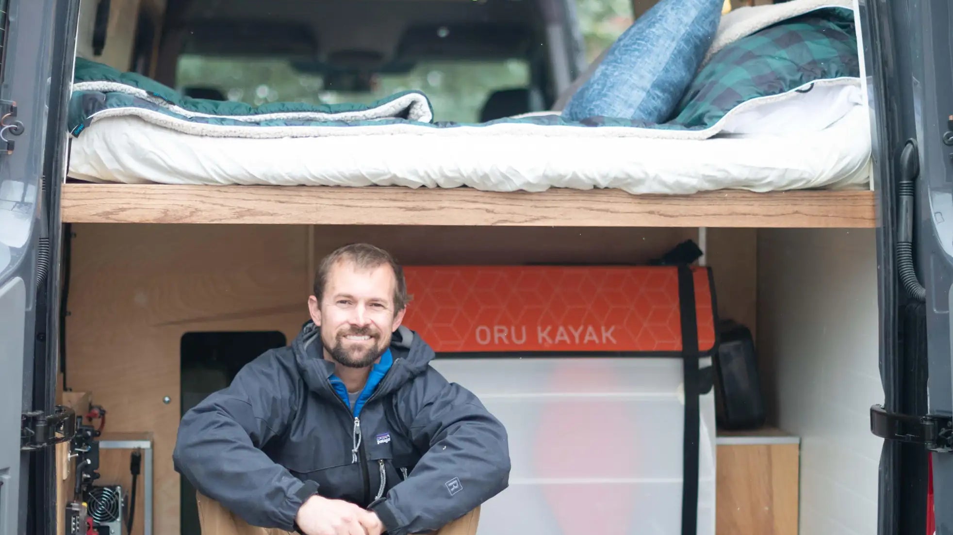 van conversion beds - The prominent feature of this camper van conversion is the elevated rear bed pla