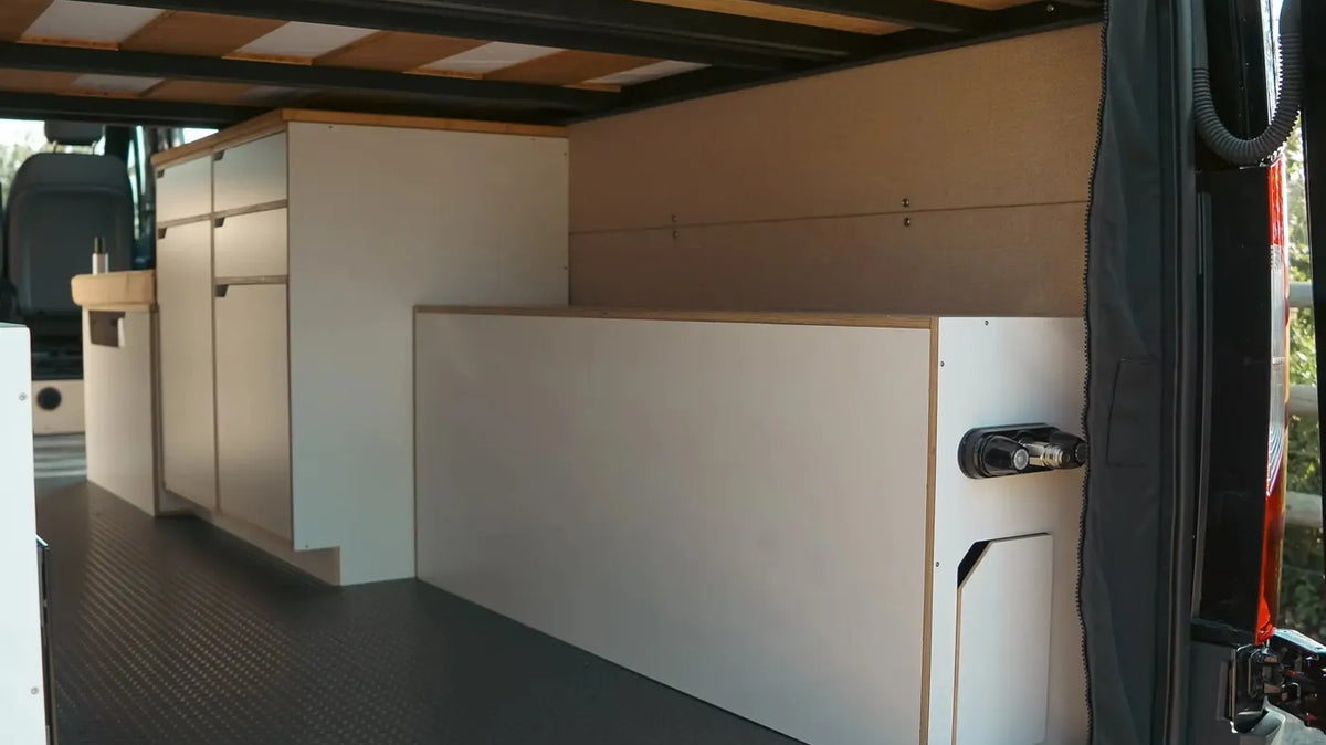 The Vansmith Production Timeline - Finished cabinets and bench inside a Vansmith Sprinter build