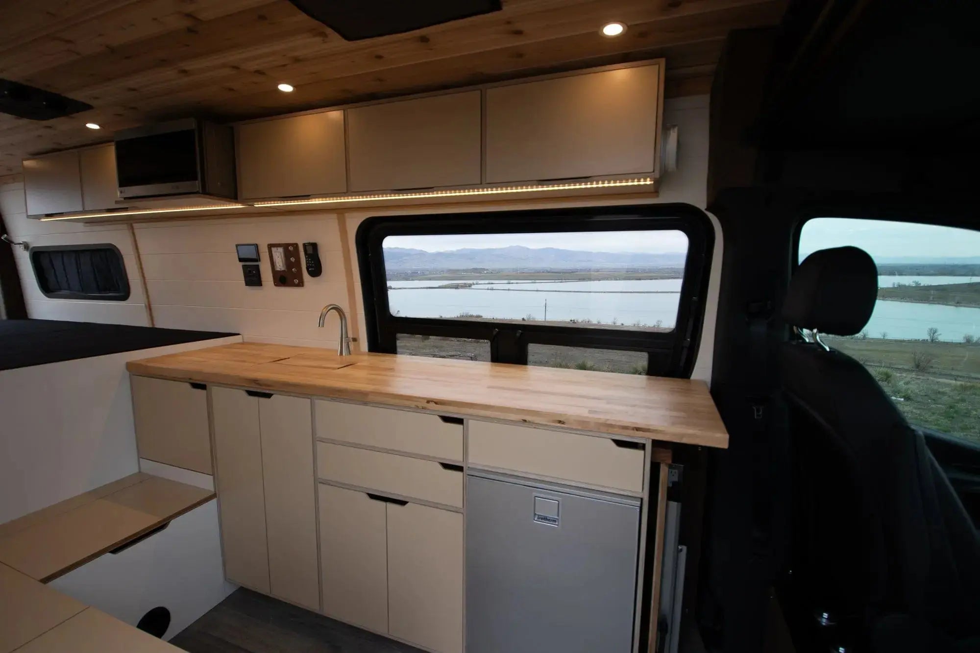 Kitchen Galley and Cabinets of Legacy DUO XL PLUS Sprinter 170 Camper Van for Sale in Colorado – The Vansmith