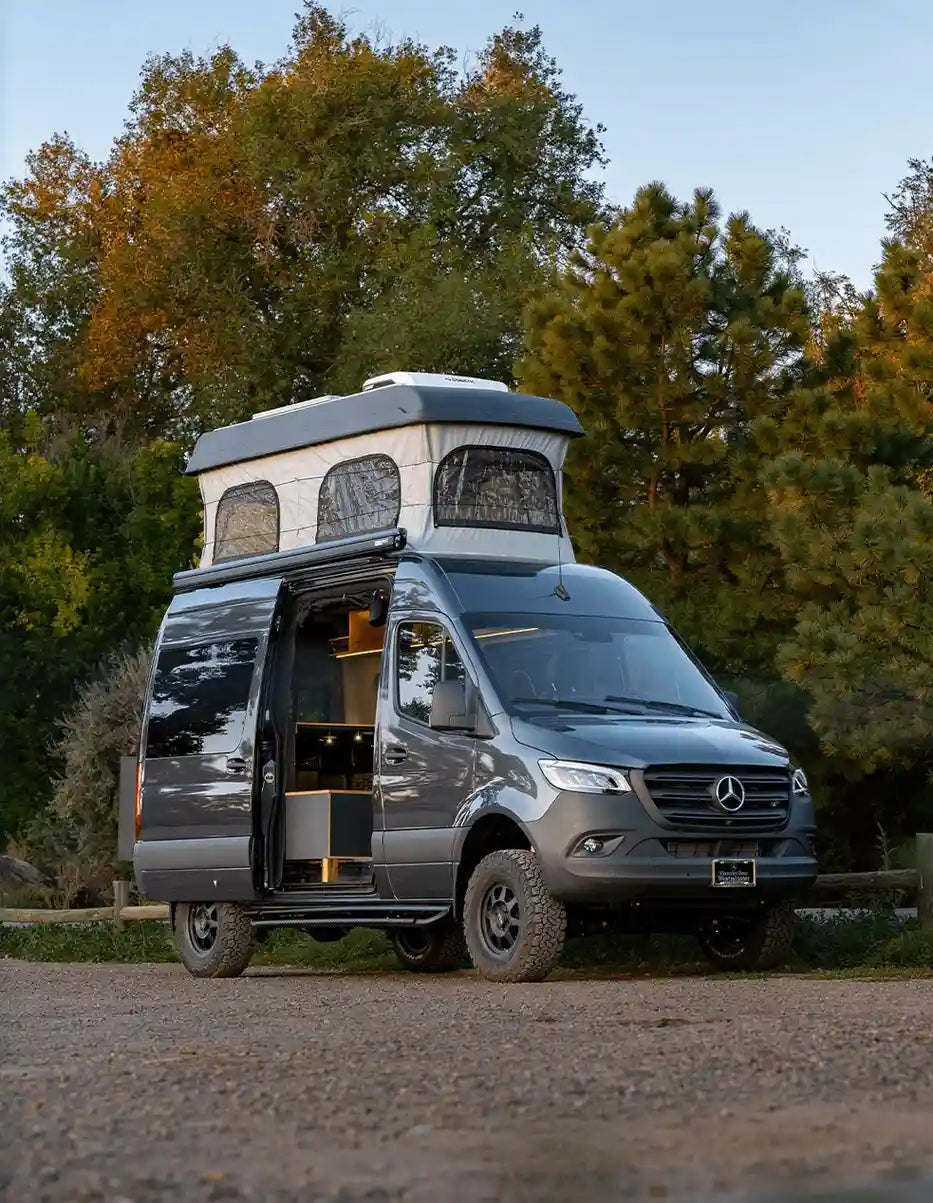 Sprinter Van Conversion with Pop-Top Raised and Sliding Door Open, Built by The Vansmith in Boulder, Colorado