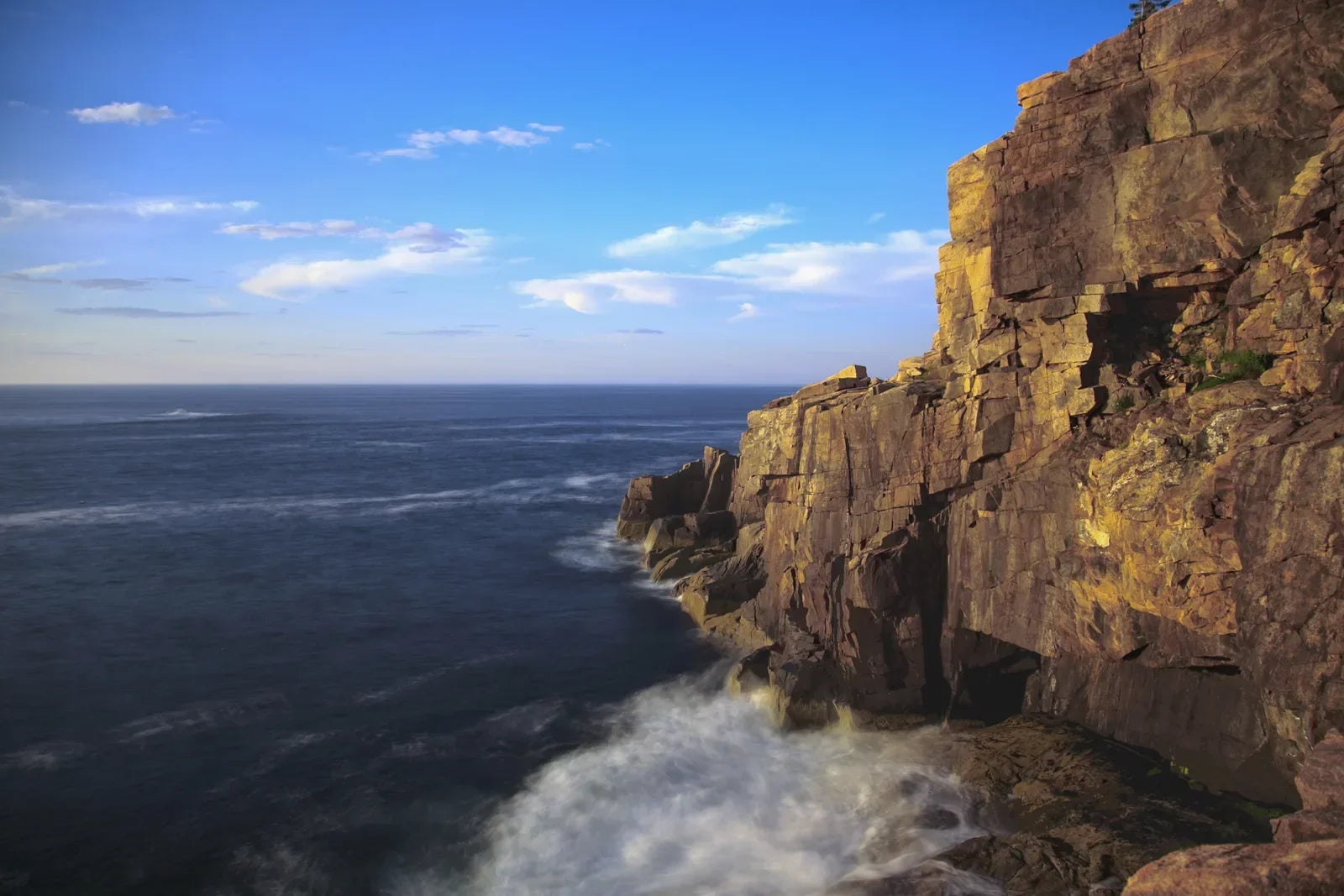 Hiking in Acadia National Park, Maine - Waves crashing at the base of Otter Cliff, Acadia National Park, Maine