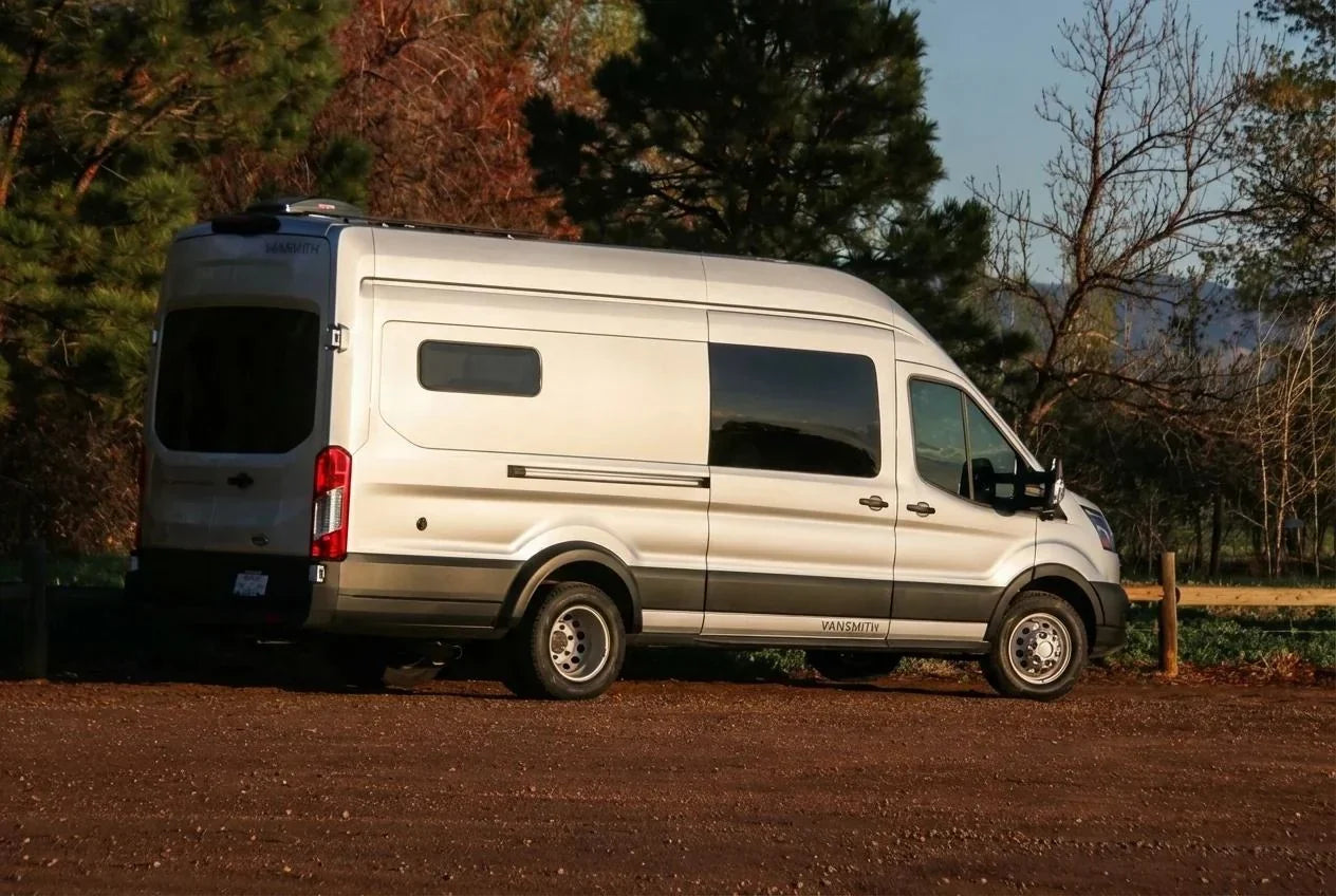 camper van financing rates - The exterior features a prominently positioned Ford Transit van with a sleek sil