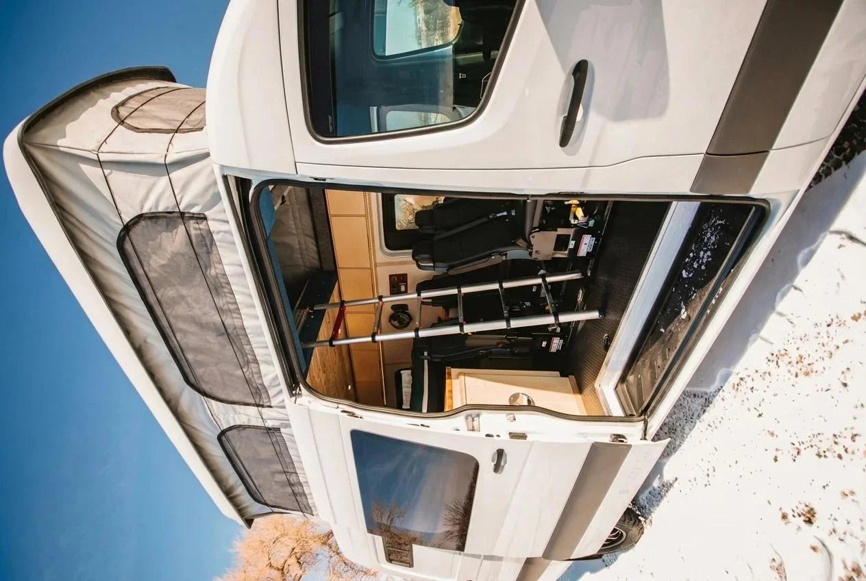 camper van mistakes - The most prominent feature in this photo is the rear cargo area of the camper va