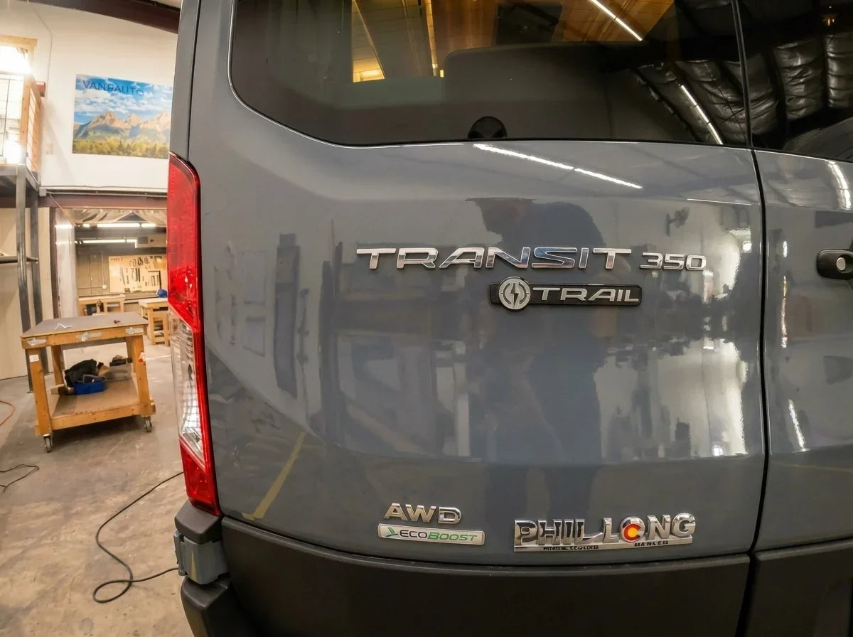 ford van models - The most prominent feature in the photo is the rear exterior of a Ford Transit 3