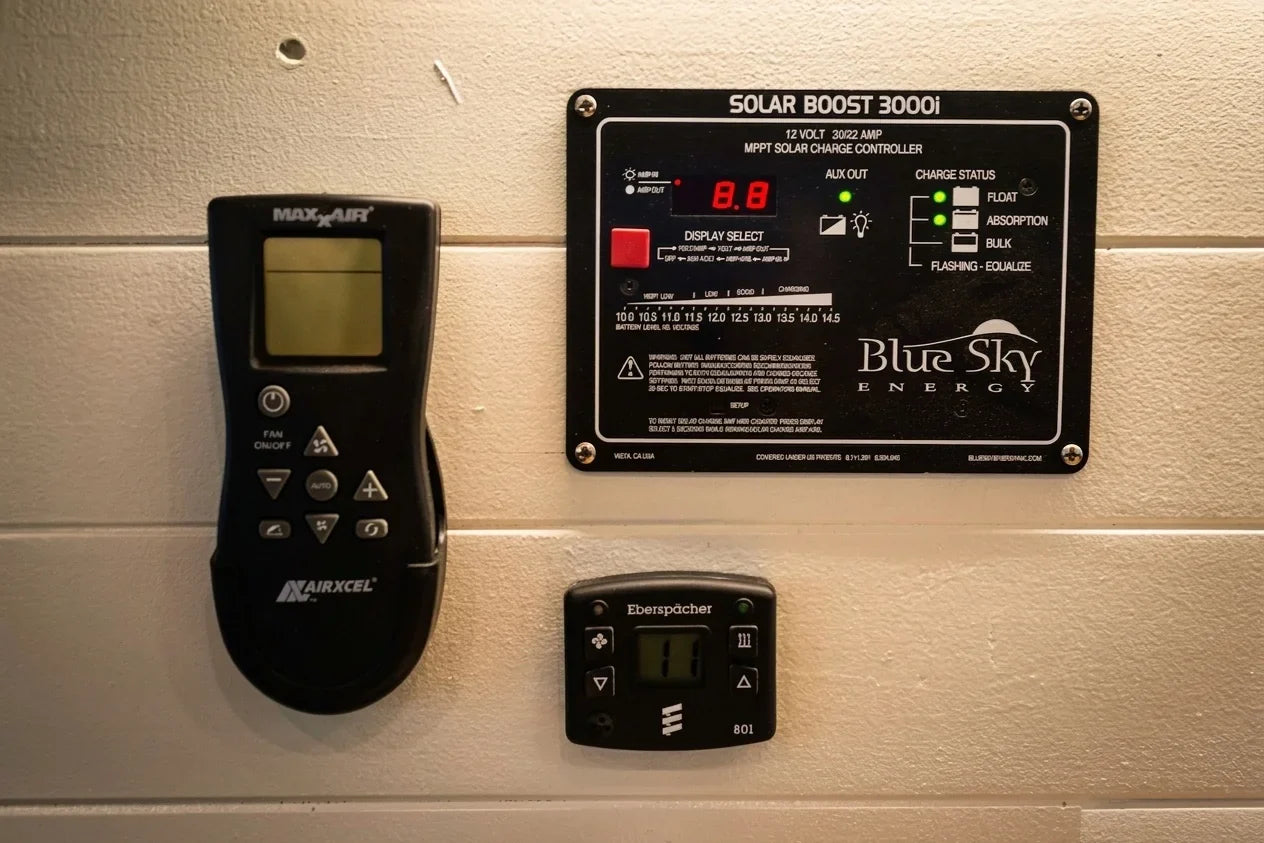 sprinter t1n maxxair fan - The most prominent feature in the photo is the solar charge controller, labeled 