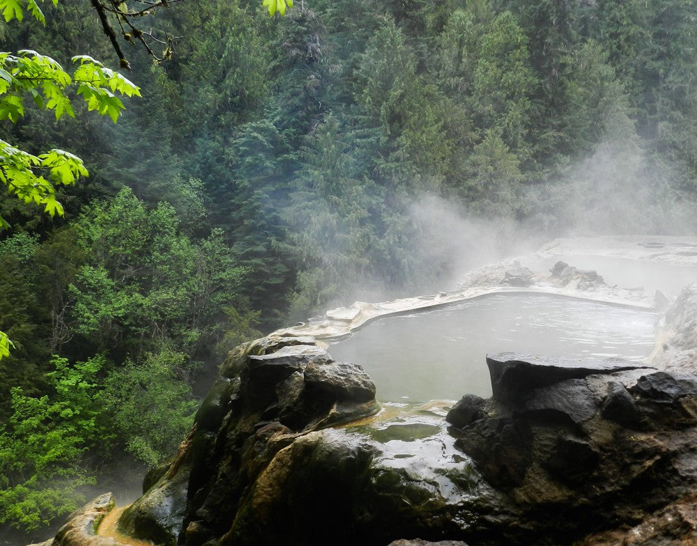 Oregon hot springs - Steam rising off a natural soaking pool at Umpqua Hot Springs in the Umpqua National Forest
