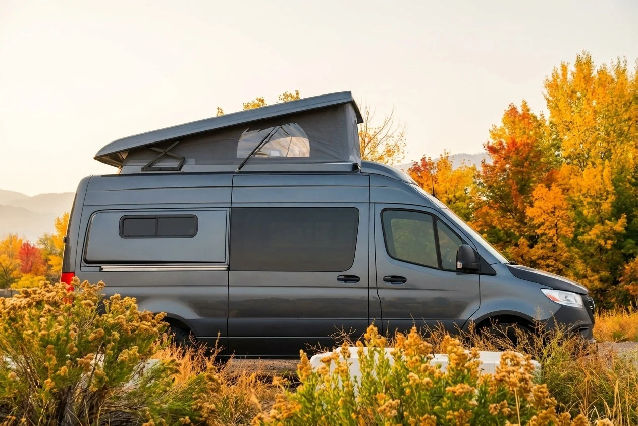 van as camper - Gray camper van parked with elevated roof for camping