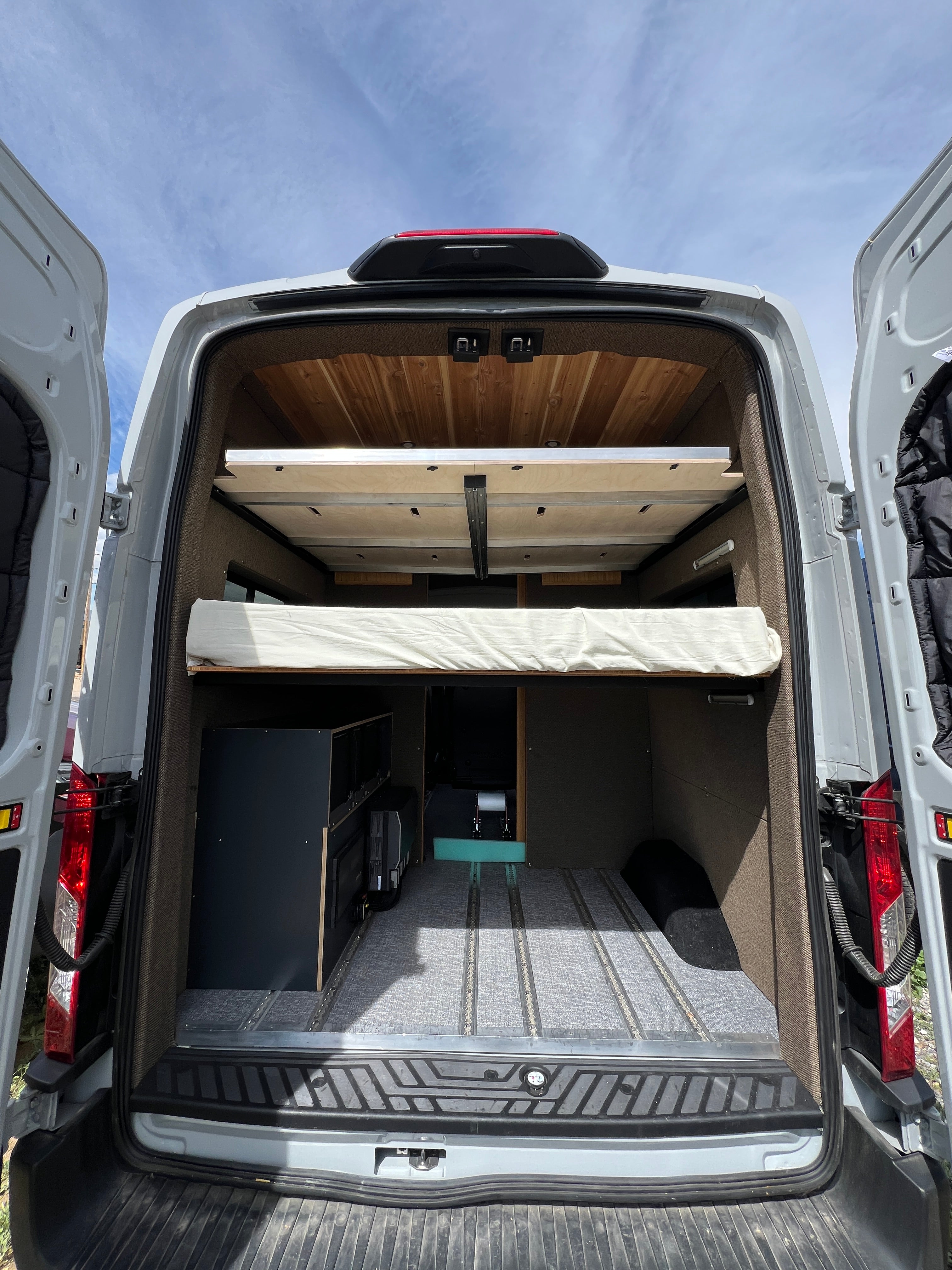 2025 Ford Transit High-Roof rear with bed deployed