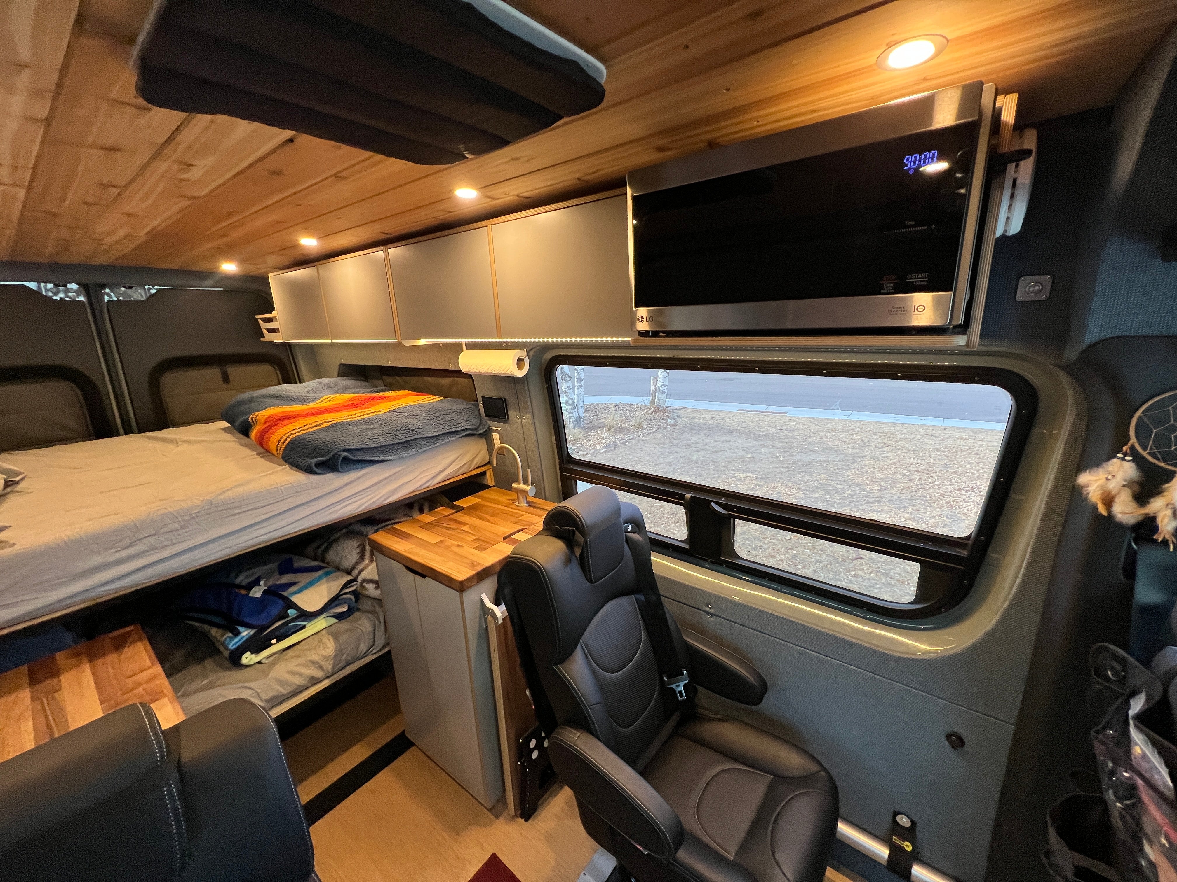 Interior microwave, cabinets, and galley