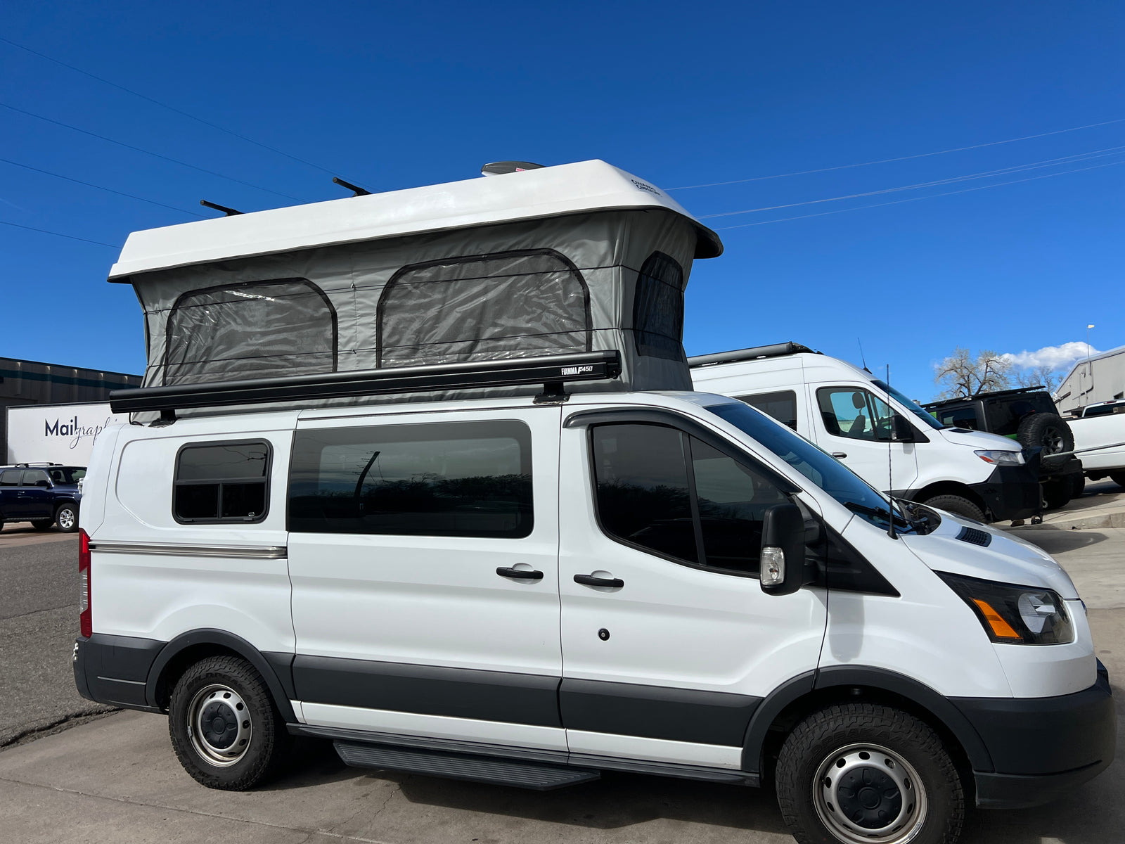 2016 Ford Transit Low-Roof Pop-Top Camper Conversion (61K Miles)
