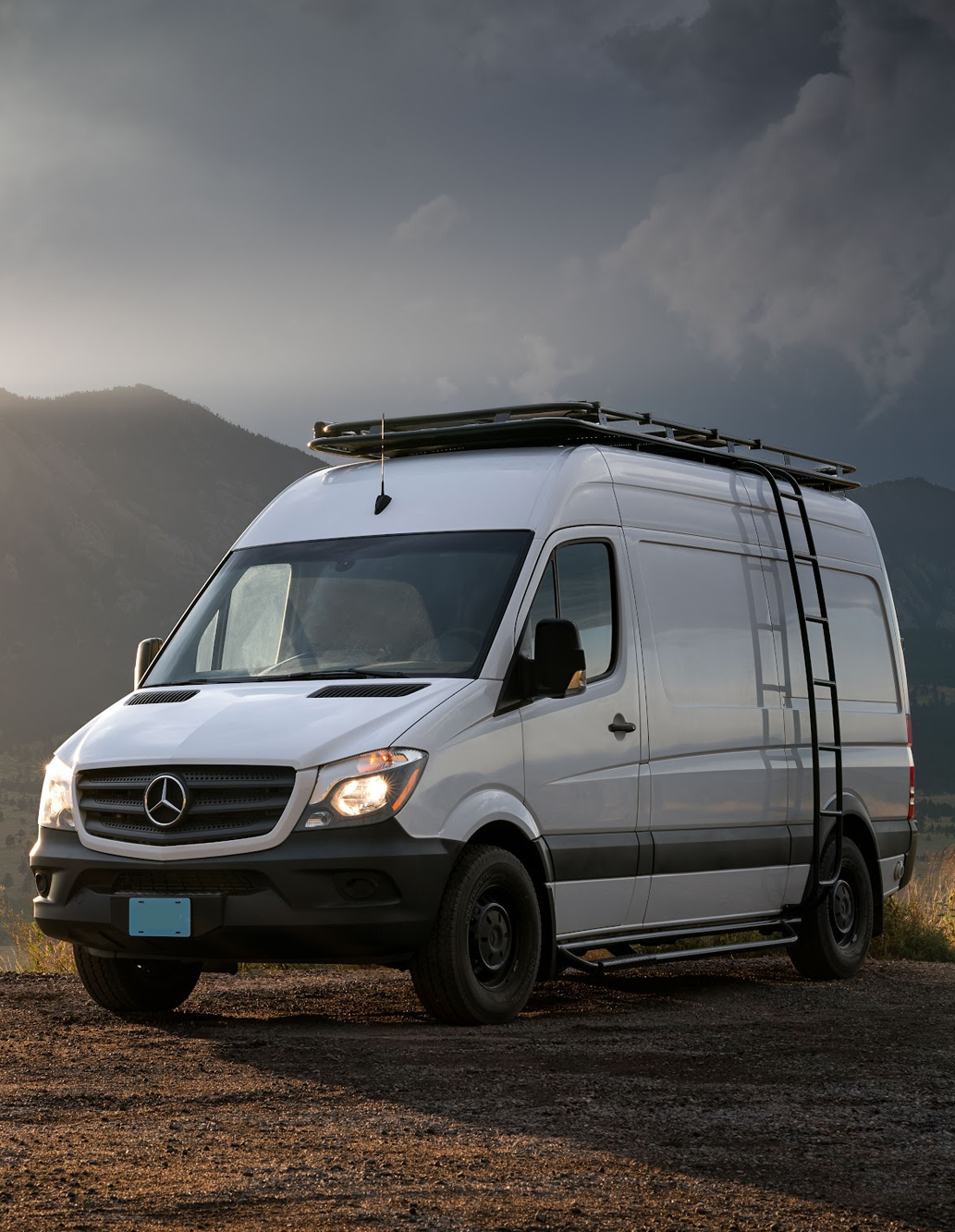 Exterior of Sprinter 144 Van Conversion in Boulder, Colorado with Sliding Door Open - The Vansmith