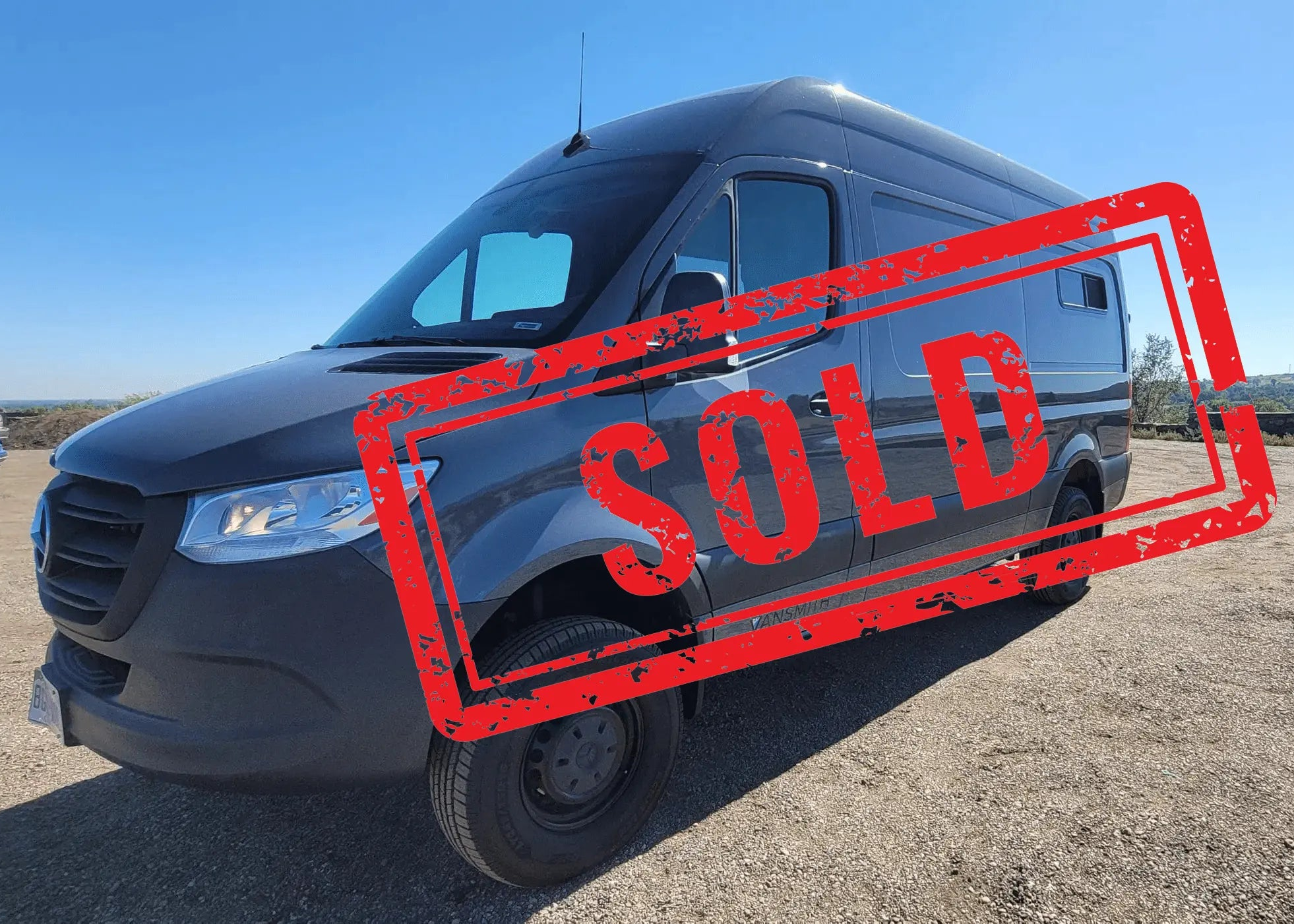 Exterior of Legacy DUO 4x4 Sprinter Van Conversion with "Sold" Stamp – The Vansmith
