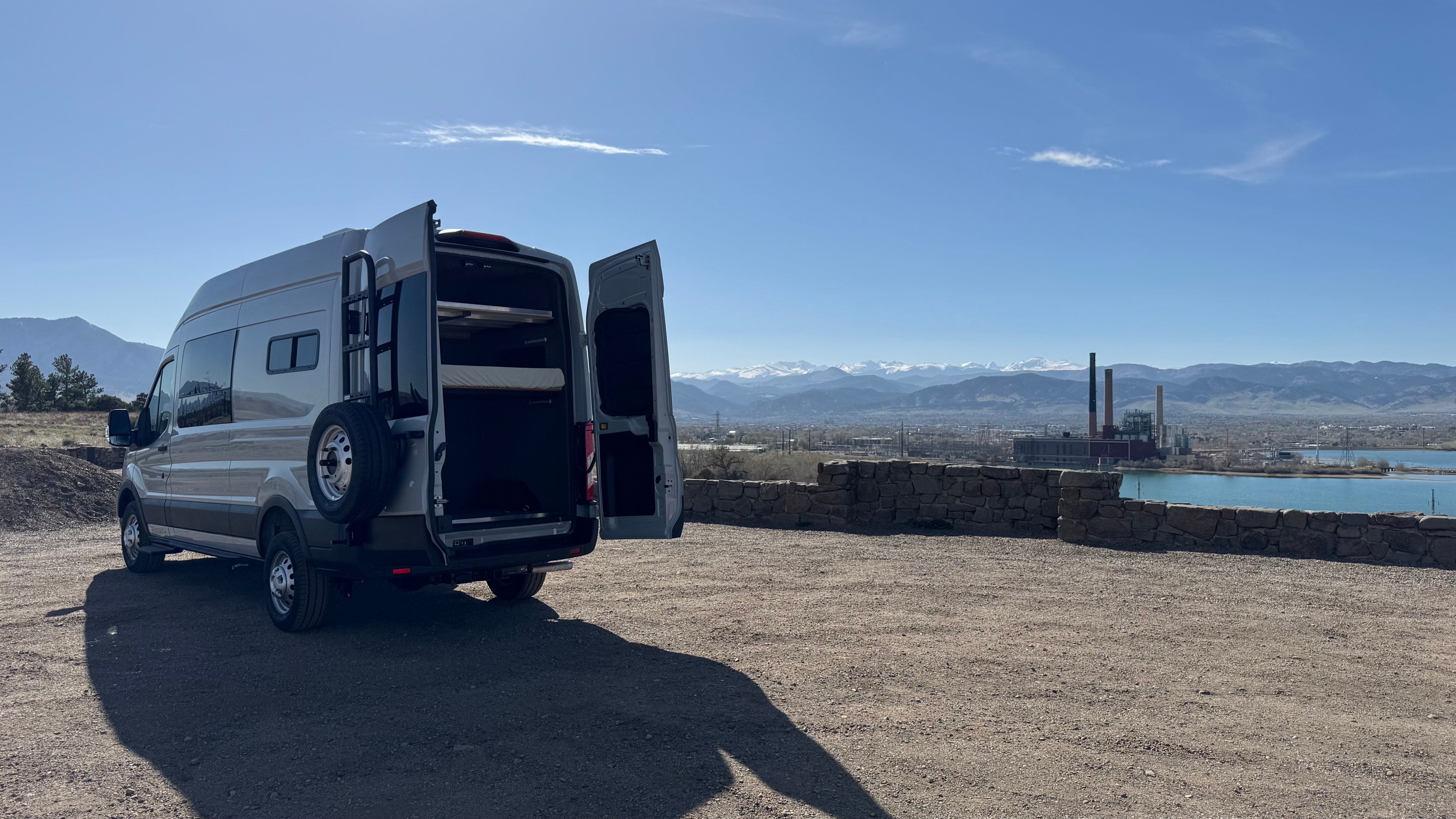 2025 Ford Transit High-Roof rear doors open with mountain view