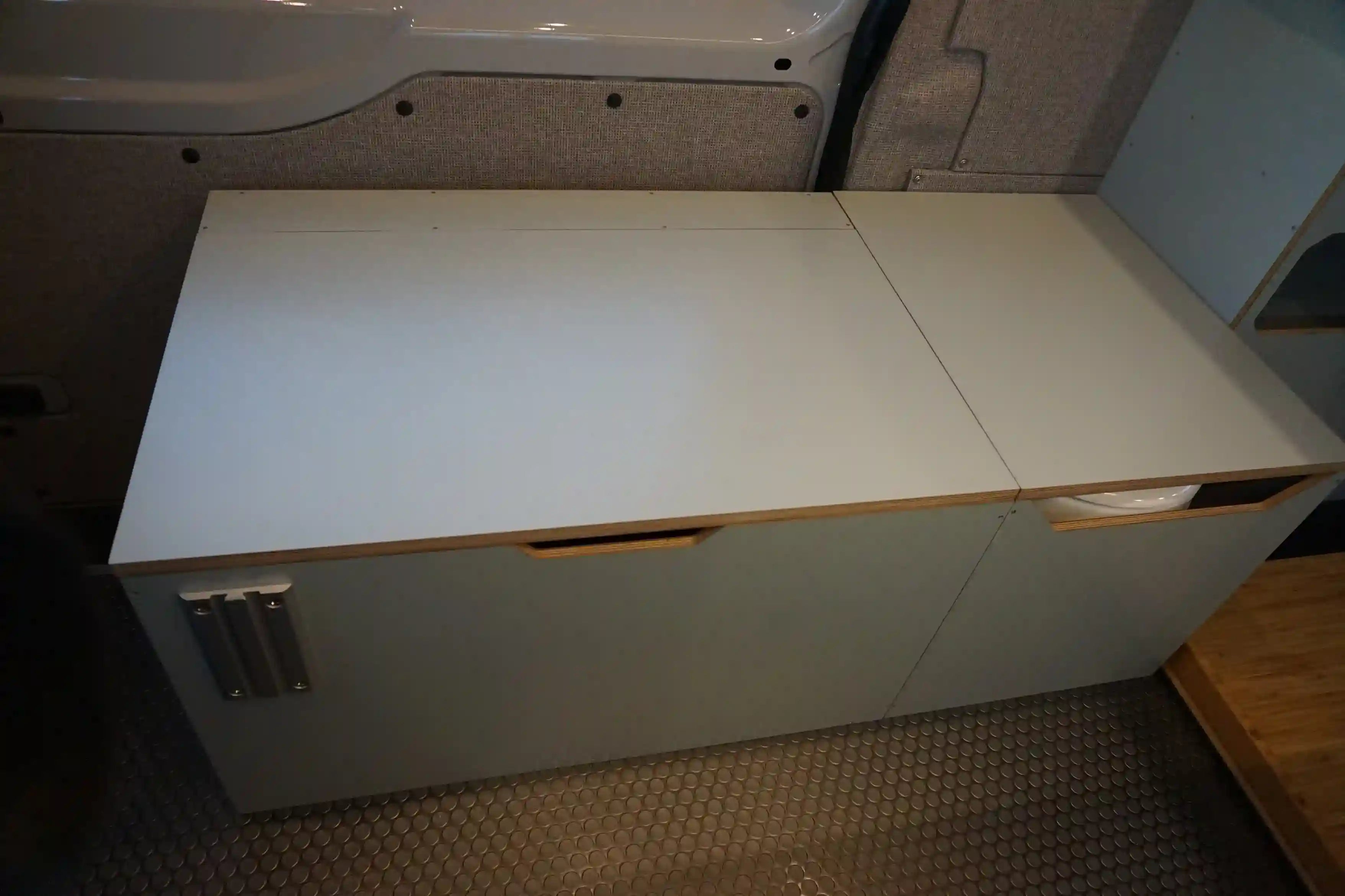Compact van wet bath showing bench shower area