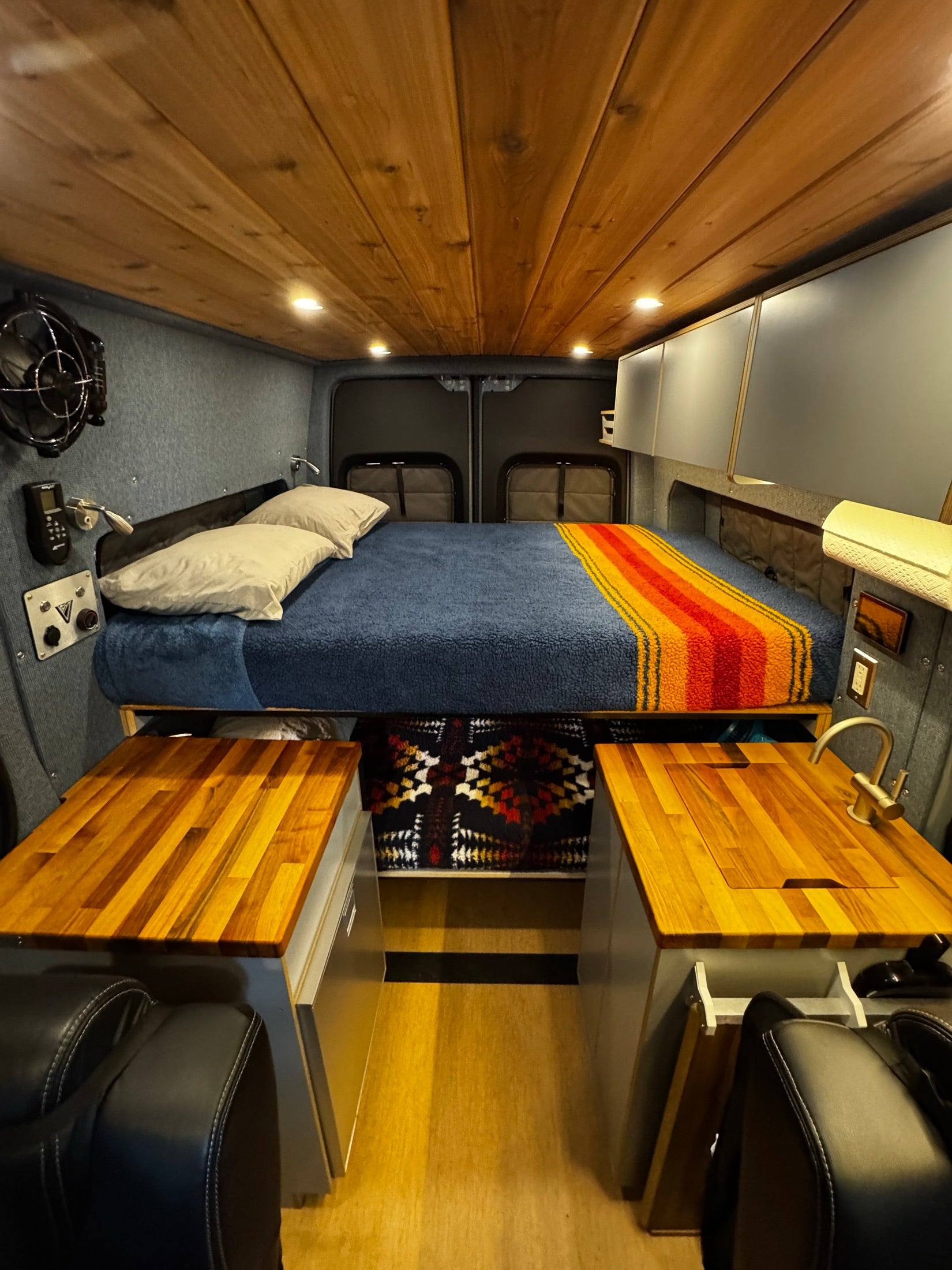 Cedar ceiling, bed, and galley, wide interior view