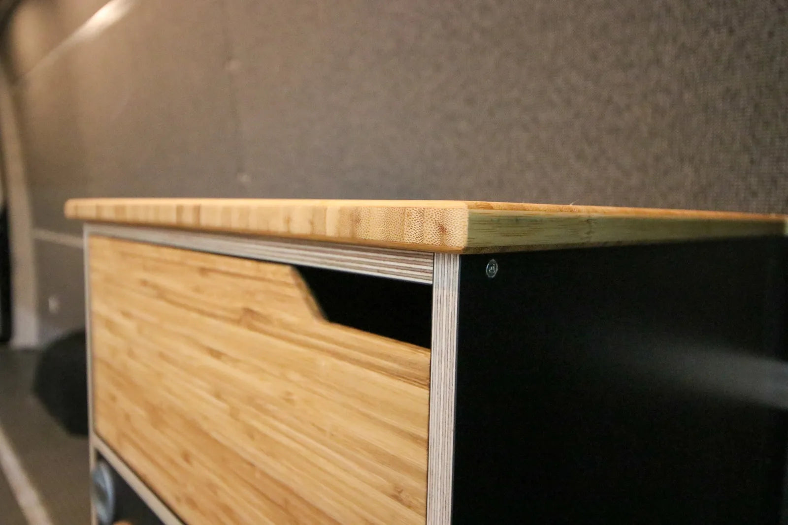 Electrical breaker panel with shore power and battery disconnect in Foundation van conversion