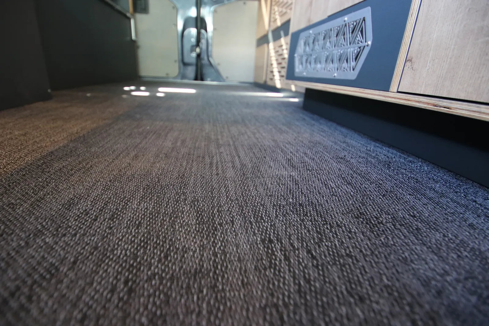 Hustle van conversion commercial-grade carpet flooring detail by The Vansmith