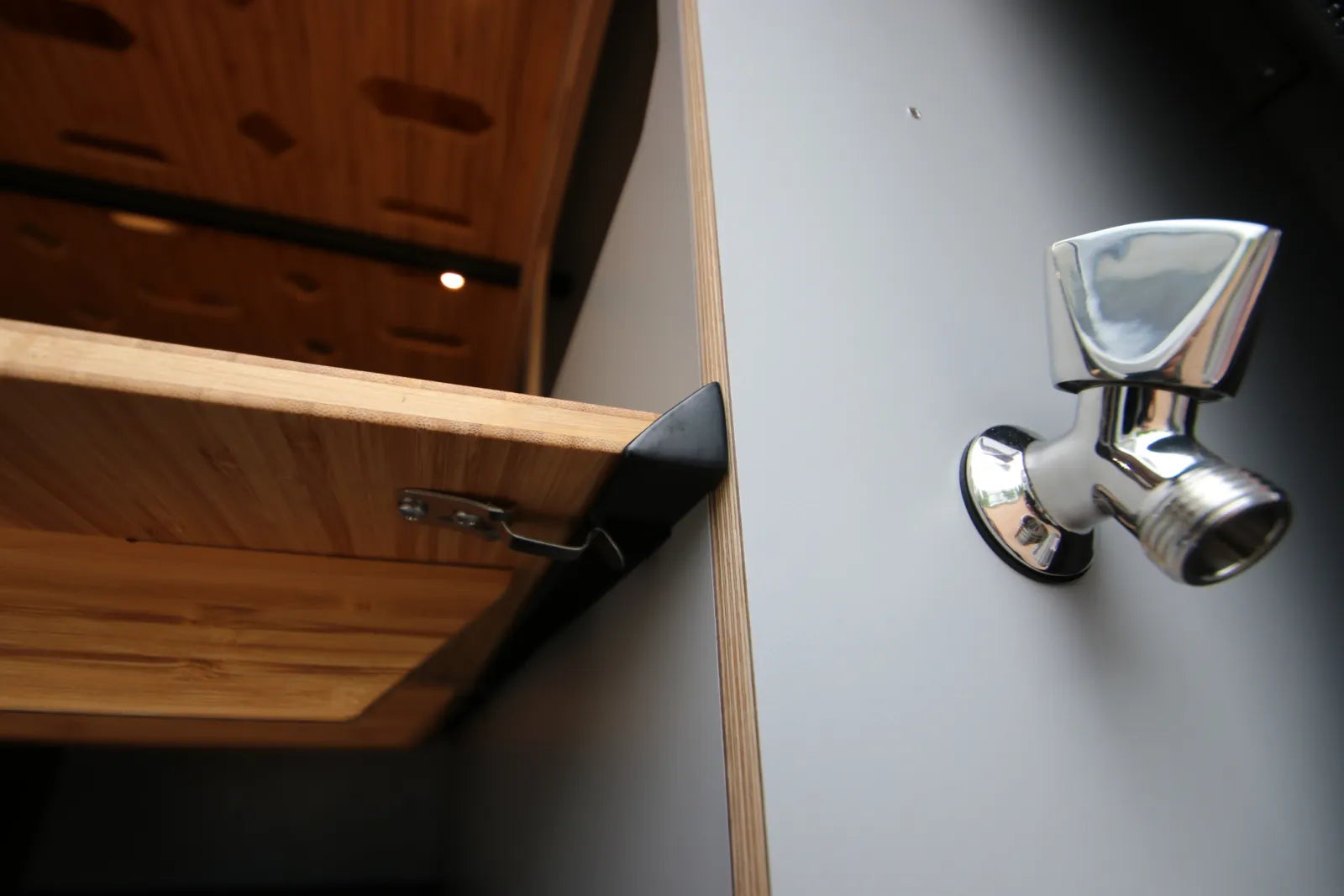 Maverick Sprinter van interior chrome shower head connection detail by The Vansmith