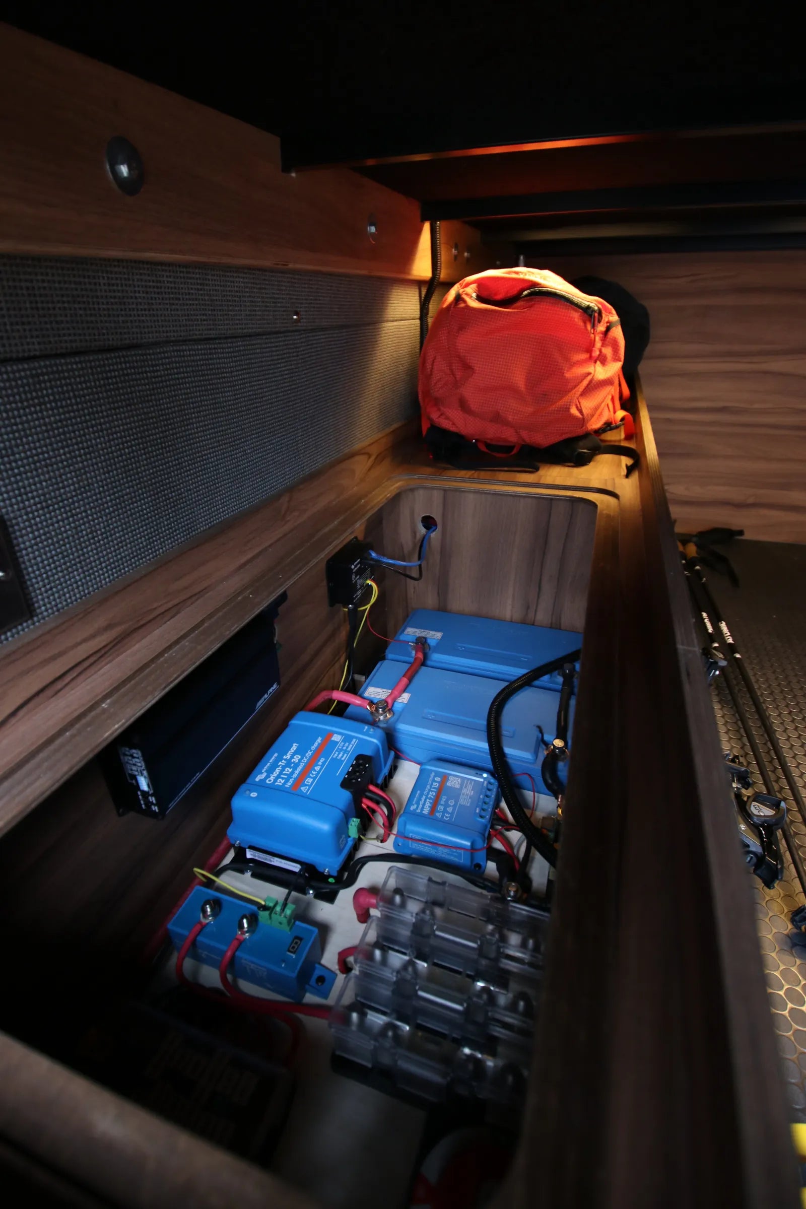Rapp van Victron battery bank and electrical system in under-bench compartment