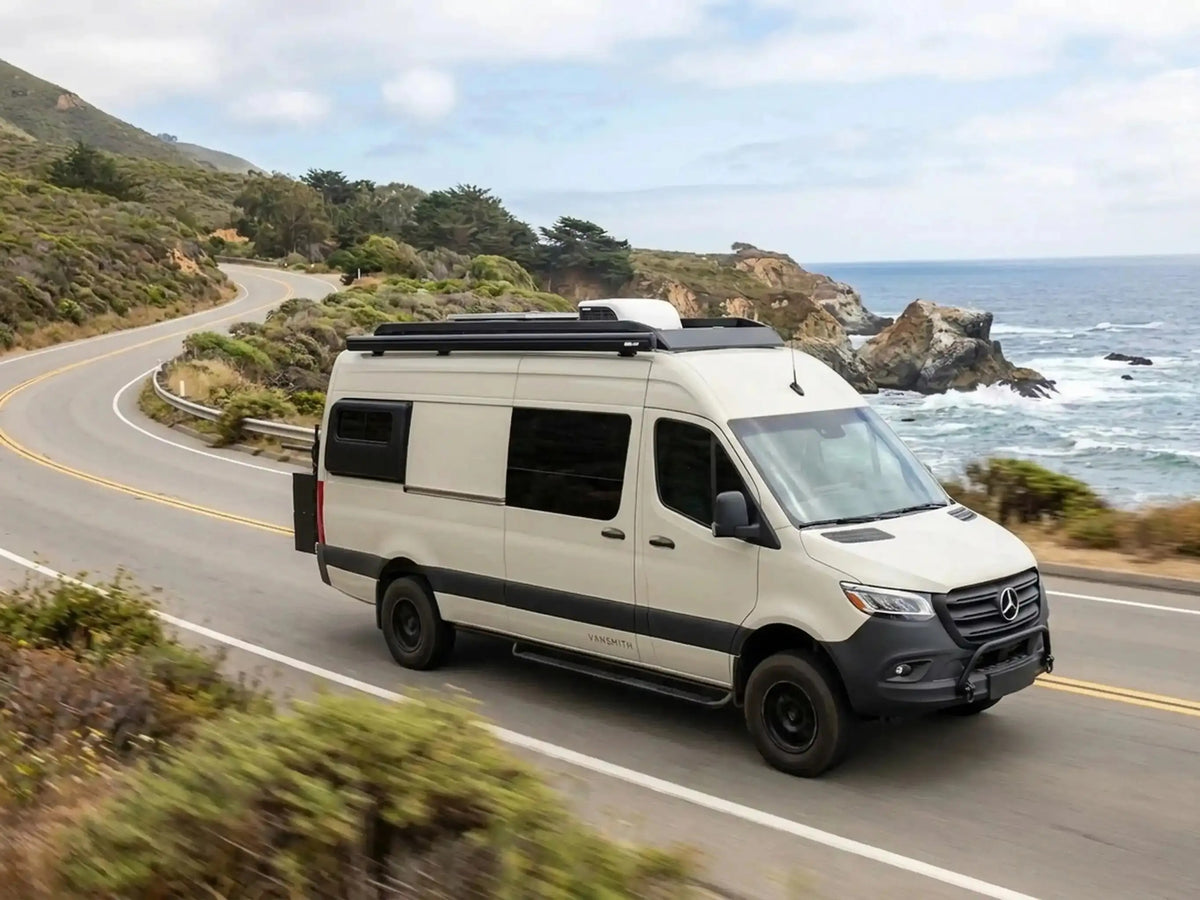 Vansmith build driving along a coastal highway